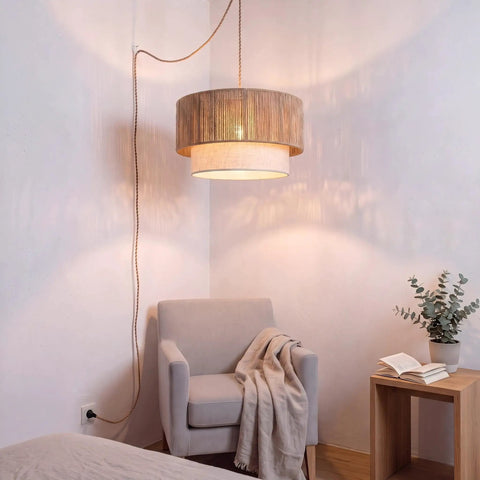 18 Inch Plug In Rattan Pendant Light With Premium Linen Shade Boho Ceiling Chandelier above a cozy chair in a softly lit room.