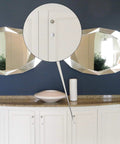 Three Sixteenth Inch Plastic Hole Plugs For Round Holes installed on cabinet near mirrors