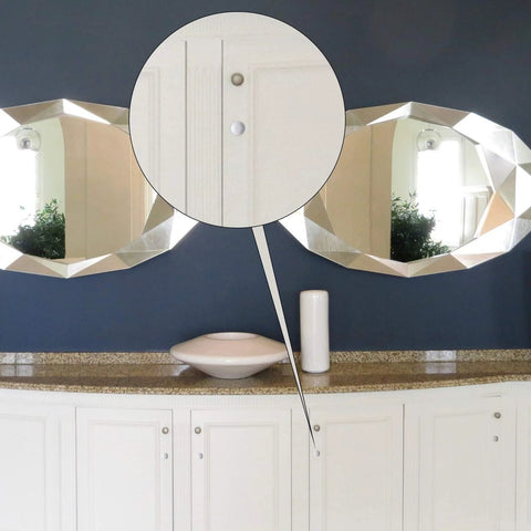 Three Sixteenth Inch Plastic Hole Plugs For Round Holes installed on cabinet near mirrors