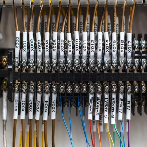 Hardcore Industrial Polyolefin Heat Shrink Tube Labels for Rock Solid Cable Tagging on various wires in a control panel.