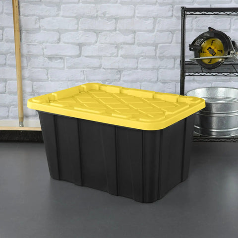 Single tote from Six Pack 27 Gallon Heavy Duty Industrial Totes With Locking Lids Stackable Plastic Storage Bins For Garage Workshop And Warehouse Organization Rugged Black And Yellow Construction in workshop.