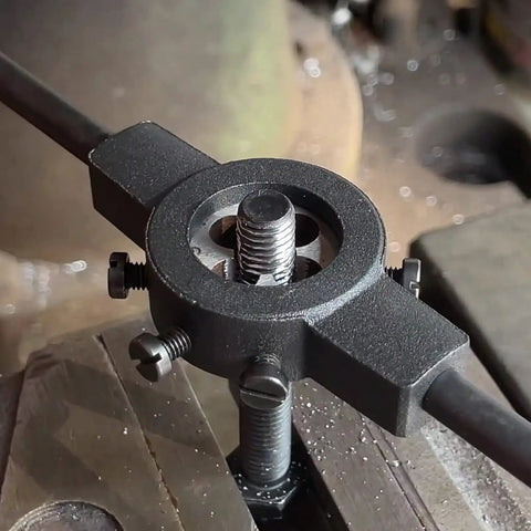 Metric M12 X 1.5 Round Threading Die For External Threads Right Hand mounted on rod in machine shop setting