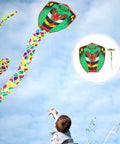Child flying a Giant Snake Kite For Adults And Kids Handmade Animal Modeling Kite With Gold Foil Large Outdoor Beach Flying Toy.