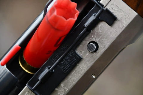 Shell Catcher for 12 Gauge Semi Auto Shotguns, Right Hand Trap Shooting Accessory, matte black in use.