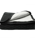US Cargo Control 80X72 Inch Heavy Duty Moving Blankets Thick Padded Furniture Padding Protective Wrap For Moving And Shipping Machine Washable Cotton Polyester Blend Black folded blanket displaying layered design.
