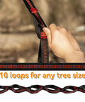 Hand adjusting tree strap of Ultralight Camping Hammock For Outdoors And Backpacking with multiple loops for versatile setup