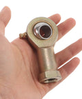Hand holding a 14 MM Rod End Bearing for 2 Pack Rig Ready Rod End Bearings 14 MM And 9 16 Female Thread Tie Rod Ball Joints With No Wiggle Steering Linkage For Atv Go Kart Hydraulic Cylinder And Track Mods.