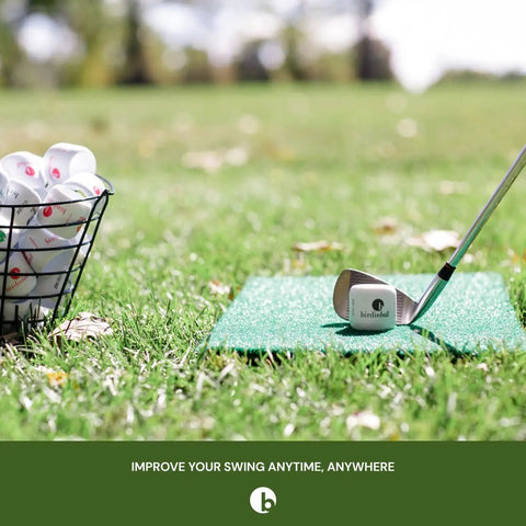 Practice Golf Balls 12 Pack With True Flight And Real Spin For Backyard And Indoor Training next to a golf club on grass