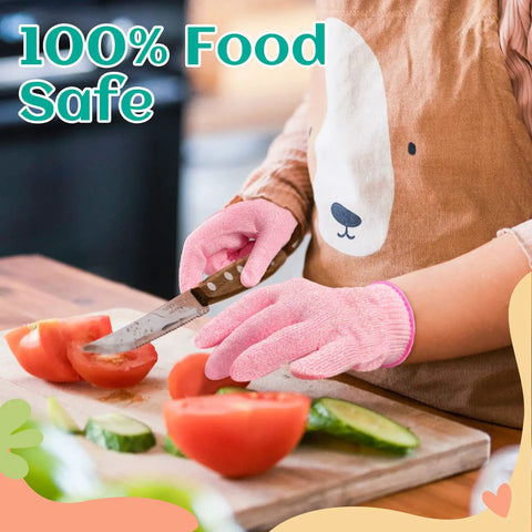 Child wearing pink Kids Cut Resistant Gloves Level 5 Protection For Cooking Wood Carving Whittling Gardening And DIY Projects Food Grade Safe Small Size For Ages 4-6 Years Pink Green Or Gray, slicing tomatoes.