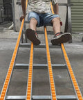 Heavy Duty Lightweight Unpowered Roller Conveyor Guides For Package Delivery With Durable Abs Plastic Rollers Perfect For Warehouse Shipping And Packing Workflows In 30 40 Or 50cm Yellow Styles, person using the conveyor.