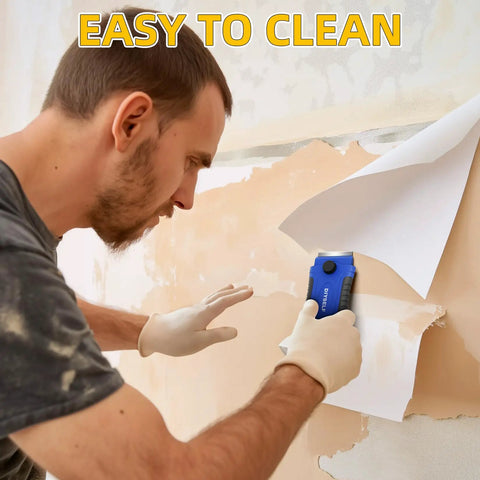 Person using Razor Blade Scraper 1 Pack With Extra 15 Blades For Glass Stove Top And Window Cleaning A Pro Grade Heavy Duty Non Retractable Rubber Handle Kitchen Scraper Tool For Stubborn Grime on wall