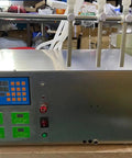 Heavy Duty Four Head Peristaltic Pump Bottle Filler For Viscous Liquids And Thick Oils Featuring Slick Digital Interface.