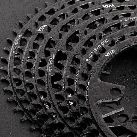 Close-up of stacked 42T 110BCD 4 Bolt CNC Aluminum Narrow Wide Chainring for road bike drivetrain upgrade showing teeth detail.