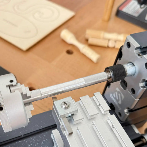 60W High Power Mini Metal Lathe Machine 12000 RPM 4 Axis Desktop Turning Tool showing spindle and chuck for precision crafting.