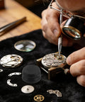 Gearhead Watchmakers Oil Dish Ceramic Reservoir For Precise Lubrication in use during watch repair with tiny components