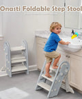 Hella Steady Adjustable Toddler Step Stool With Handles Converts From 3 To 2 Setup As Kiddos Grow Non Slip Safety Footrest For Bathroom Sink And Kitchen Counter Grey in use, toddler accessing sink.
