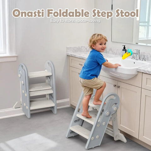 Hella Steady Adjustable Toddler Step Stool With Handles Converts From 3 To 2 Setup As Kiddos Grow Non Slip Safety Footrest For Bathroom Sink And Kitchen Counter Grey in use, toddler accessing sink.