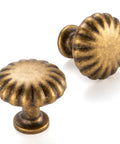 Round Antique Brass Cabinet Knobs 1-1/4 Inch, 10 Pack, Beefy Heavy Duty Metal Hardware With Rust Resistant Finish, Includes Two Screw Sizes 1 Inch And 1-1/2 Inch For Easy Installation On Kitchen And Bathroom Cabinets shown front and side