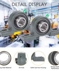 Two UCP205-16 mounted pillow block ball bearings, 1" bore, bearing steel races in solid cast-iron housing with bolt holes.