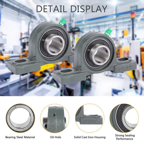 Two UCP205-16 mounted pillow block ball bearings, 1" bore, bearing steel races in solid cast-iron housing with bolt holes.