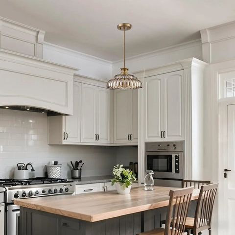 Straight Up Vintage Amber Glass Pendant Light With Ridiculously Smooth Adjustable Hanging Cord And Killer Floral Design For That Total Glow Up Look You Always Wanted hanging in a modern kitchen above a wooden table.
