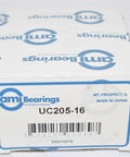 Box of AMI Bearings UC205-16 for mounted insert pillow block, single pack with normal bore in mm, ID, OD and width specified for sealed ball bearing applications.
