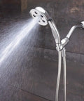 Premium Handheld Shower Head With AnyStream 360° Technology spraying water, mounted on a bathroom wall.