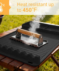 Silicone Grill Mat For Blackstone Griddles And Outdoor Grills, Heat Resistant To 450°F, Black, on wooden table outdoors