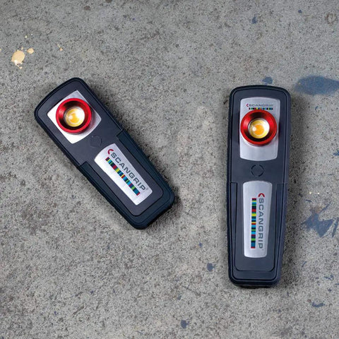 Two Portable Rechargeable LED Two Color Work Light With High CRI shown on concrete surface, featuring IP65 dust and waterproof design.