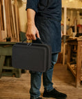 Person holding a Beefy Tool Case Organizer For Dewalt 20V Max XR Oscillating Multi Tool DCS356B DCS354B, standing in workshop.