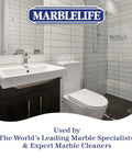 Clean bathroom with white tiles showcasing Maxout Deep Grout Cleaner For Tiles And Floors Powerful Ready To Use Cleaning Liquid.