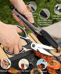 Using tongs and scissors from the All In One Outdoor Camp Kitchen Gear, 15 Piece Camping Cookware And Utensil Set during outdoor cooking