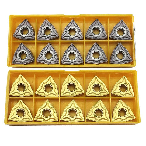 Front view of two yellow trays containing 20 WNMG triangular carbide turning inserts in bronze/gold and gray finishes.