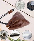 Hardy Cowhide Leather Drawstring Pouch With Vintage Retro Finish Designed For Hauling Your Daily Grind Essentials Travel Toiletries And Quick Pocket Stash on a wooden table.