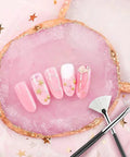 Pink nail designs on gold edge resin palette from 22 Piece Nail Art Tools Set With Gold Edge Resin Palette And 2 Way Acrylic Silicone Engraving Pen And Dotting Pen Kit For DIY Nail Art At Home Salon Display Board Pink.