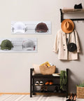 Four Piece Metal Hat Display Racks For Slat Wall Measuring 13 By 7.9 By 3.8 Inches displayed with hats in a room