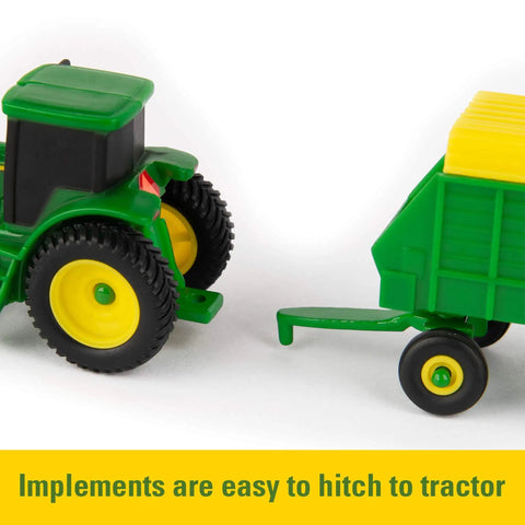 Close-up of John Deere Farm Toy Set 1 64 Scale Tractors And Trucks Playset with a tractor and hitchable trailer detail