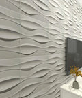 Wave Wall Panels 19.7 Inch Square Pack Of 12 White PVC Panels For Living Room And Kitchen DIY Friendly Fire Resistant Lightweight 32 Sq Ft Coverage For Home Use displayed in a modern room.