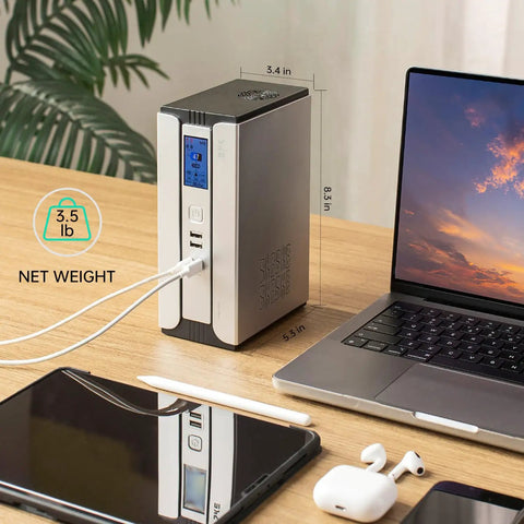 Compact 30000mAh Battery Backup Uninterruptible Power Supply With Surge Protector For Router, Modem, And PoE Devices, USB Type C And DC Ports, LiFePO4 Power Bank Keeps Your Internet On During Outages visible on desk next to laptop.