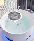Durable Silicone Hair Catcher Inside Drain Protector for bathroom bathtub showing gray stopper in white tub.
