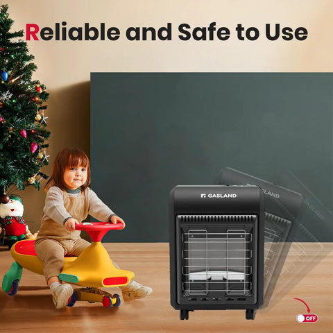 Portable Propane Radiant Heater With 18000 BTU For Warmth Up To 450 Sq Ft next to a child on a toy near a Christmas tree.