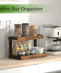 Two Tier Countertop Spice Rack Organizer in Rustic Brown Wood Finish with coffee supplies on kitchen counter