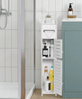 Slim Over Toilet Storage Cabinet For Small Bathrooms with two doors, adjustable shelves, narrow white design next to sink in bathroom