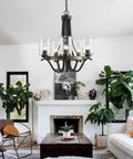 Three Light Modern Farmhouse Chandelier With White Fabric Shade for dining room with ripple glass shades over living room.