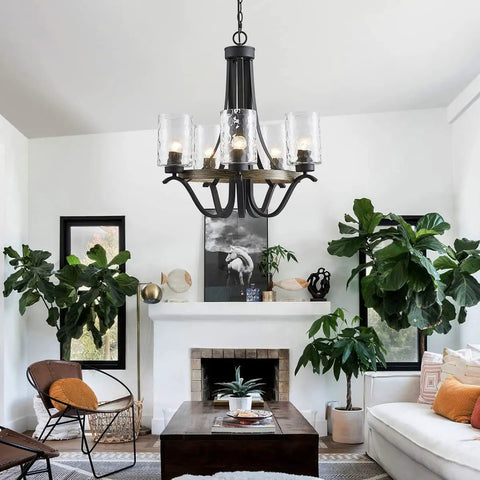 Three Light Modern Farmhouse Chandelier With White Fabric Shade for dining room with ripple glass shades over living room.
