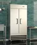 Built Tough Two Door Reach In Commercial Freezer 27 6 Cubic Feet Stainless Steel Kitchen Workhorse With Six Adjustable Shelves Digital Temp Control And Fast Auto Defrost System in modern kitchen setting.