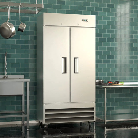 Built Tough Two Door Reach In Commercial Freezer 27 6 Cubic Feet Stainless Steel Kitchen Workhorse With Six Adjustable Shelves Digital Temp Control And Fast Auto Defrost System in modern kitchen setting.