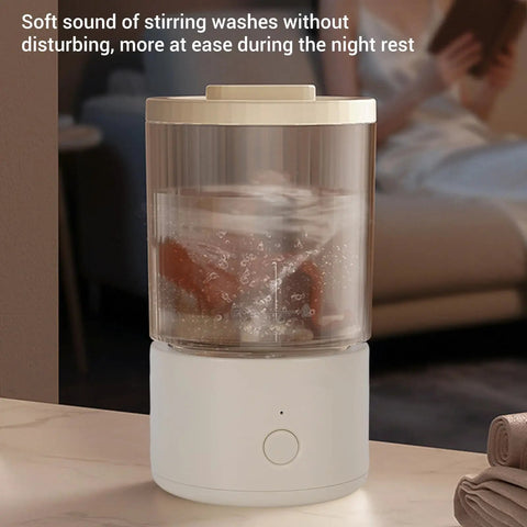Portable Mini Washing Machine 1.6L Rechargeable Cordless Foldable Design, showing gentle washing action in a clear tank.