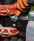 Extra Capacity Jaw 4 Inch Adjustable Wrench For Tight Spaces With Forged Heat Treated Alloy Steel SAE And Metric Scales Smooth Turning Knurl Dope Grip For Easy Single Hand Operation Plastic Dipped Handle Laser Markings Klein Tools O5064 in use on a pipe fitting.