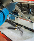 Worker using 3 Inch Manual Sheet Metal Bender And Straight Jaw Hand Seamer for metal folding near machine, lightweight tool shown.